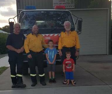 COMMUNITY SUPPORT: Rylan Cole and younger brother, Kai visited Lorne RFS to handover fundraising money earlier this year.