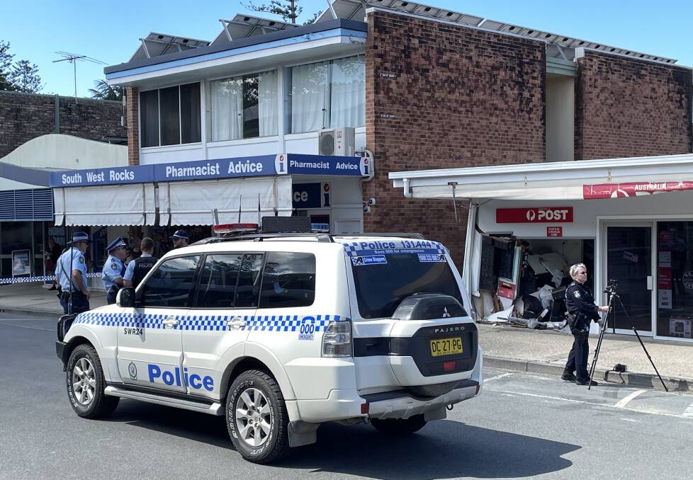 A crime scene is established by police after a car smashes into the post office, hitting a pedestrian at South West Rocks. Picture Ellie Chamberlain