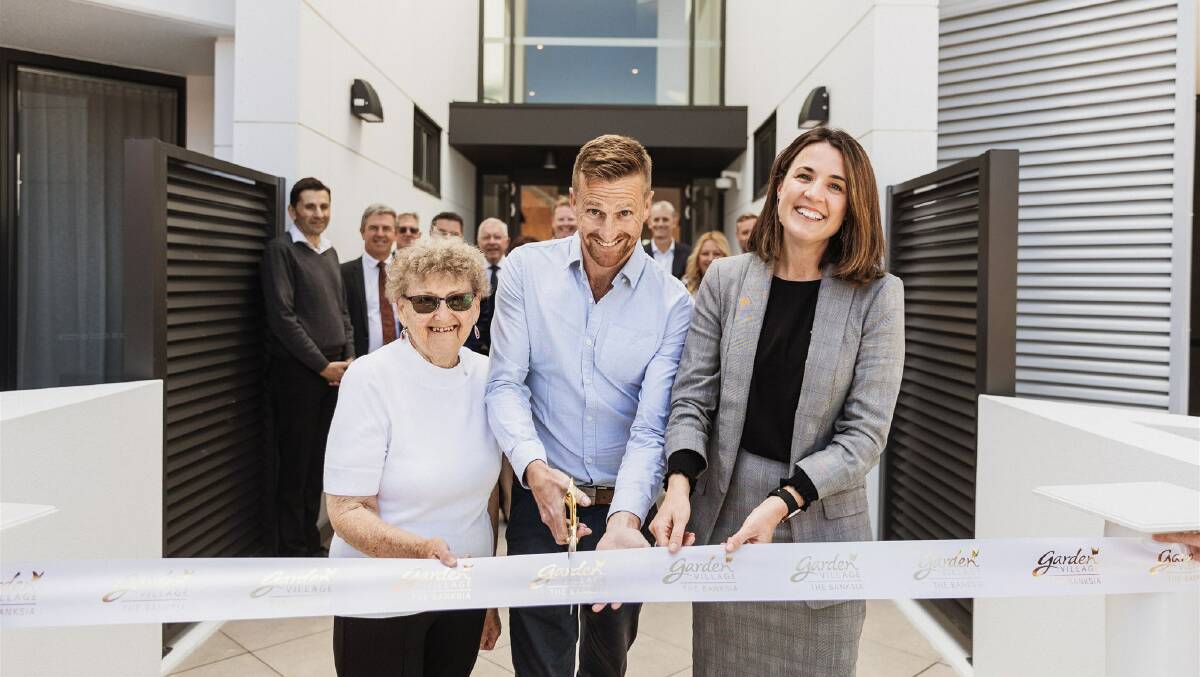 The ribbon was cut at the grand opening by Garden Village resident Phyllis Goodwin, Site Manager from BESIX Watpac Jack Walton and Retirement Living manager Sarah Ogilvie. Picture supplied