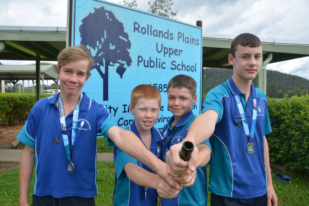 Rollands Plains Upper Public School students Oliver Regan, Lucas Gray, Stan Sippel and Angus Mackay have returned from the NSW PSSA Primary Athletics Championships with medals, certificates and plenty of praise. Picture by Emily Walker
