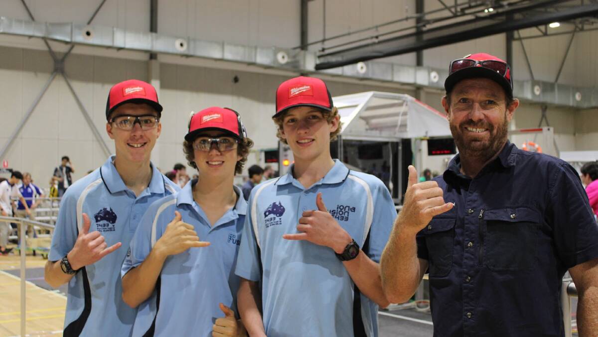 St Columba Anglican School head of technology and head of Iona Fusion Justin Munro with students at the FRC Southrn Cross Regional Championship. Picture supplied