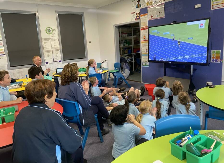 Rollands Plains Upper Public School students gathered to watch the live stream of the team's race at the NSW PSSA Primary Athletics Championship. Picture supplied