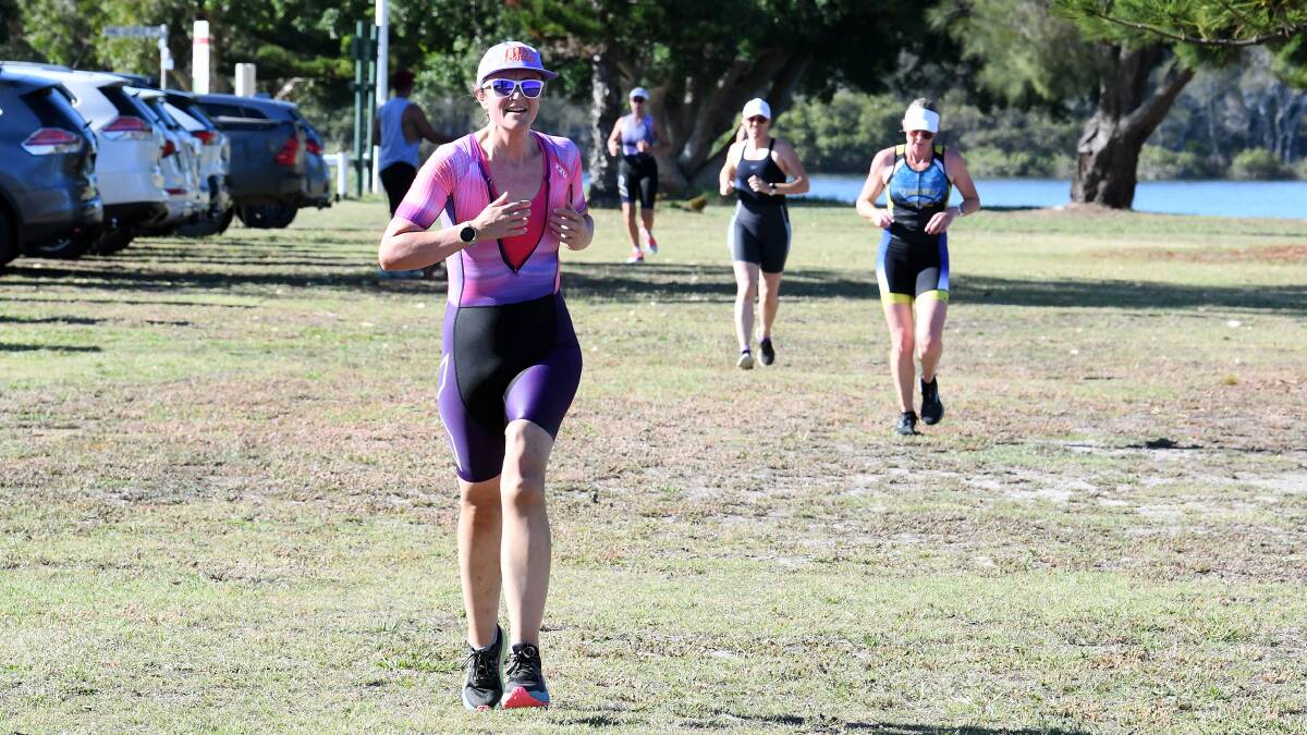 Emma Tucker runs to the finish line in the Girls Only Triathlon at Forster in January, where she was third overall. 
