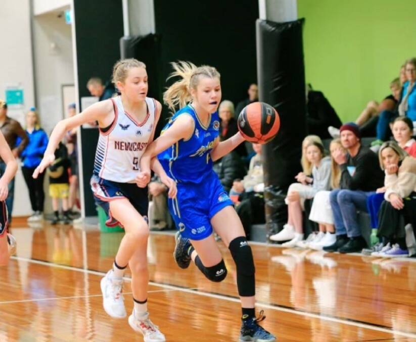 Miah Brochmann drives to the basket for Port Macquarie's under-14 girls team. Photo: supplied