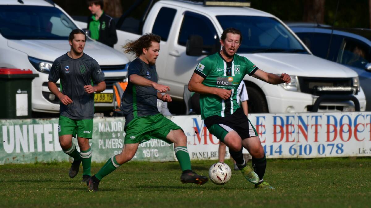 Matt Broderick contests possession in Port United's 2-1 loss to Sawtell. Photo: supplied