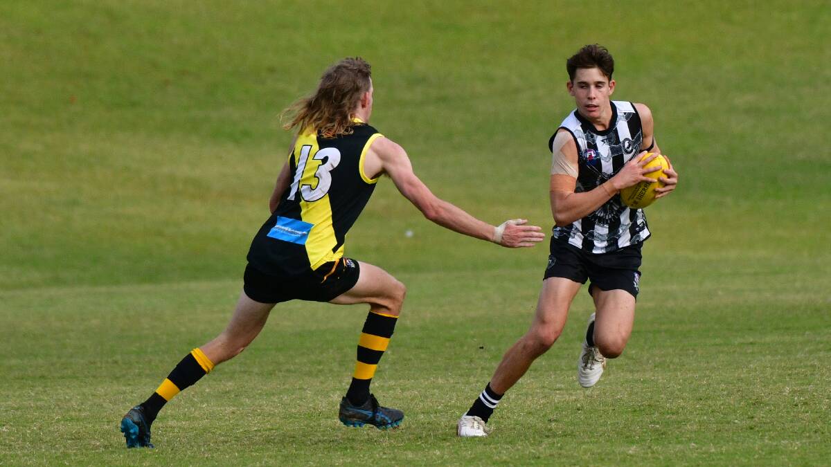 Will Kelly evades the Grafton defence. Picture by Paul Jobber