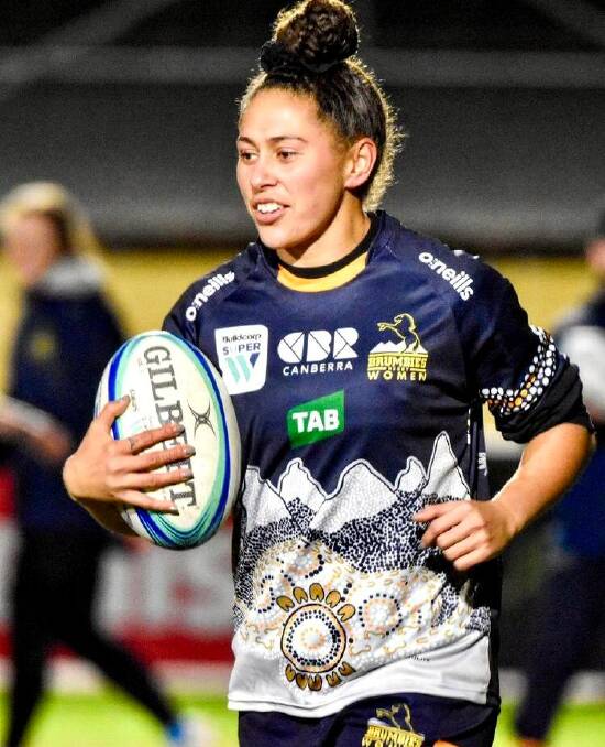 Talei in action during the warm-up for the ACT Brumbies women's team.
