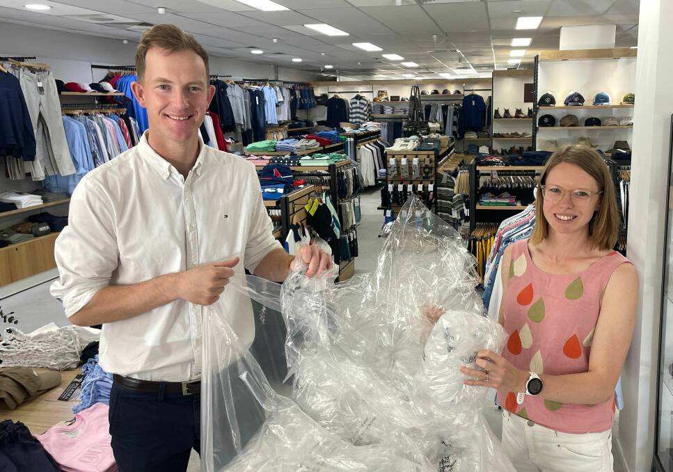 Charlie and Zoe Cull manage the Assef's store in Port Macquarie and are shocked by how many items are wrapped in plastic. They said there should be more incentives to address the issue from an industrial level. Picture by Liz Langdale 