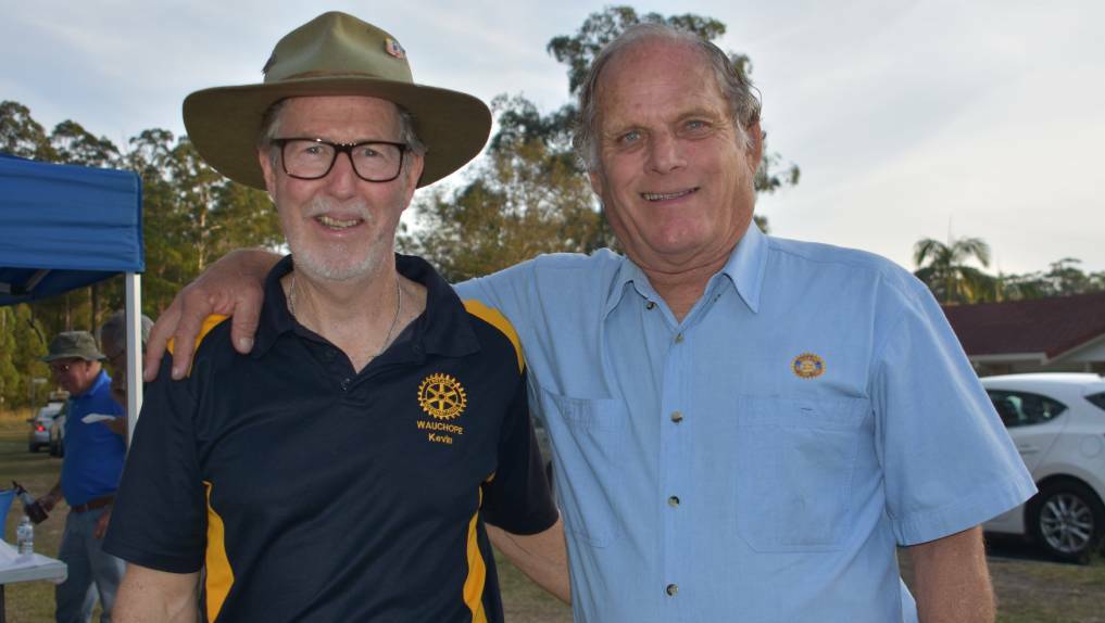 Wauchope Rotarians Kevin Whitbread and Reg Pierce at a community event. Picture by Laura Telford