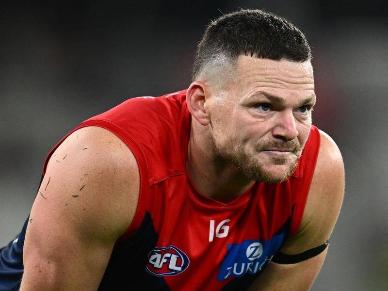 Melbourne have backed star defender Steven May after he was fined for staging against the Kangaroos. (Joel Carrett/AAP PHOTOS)