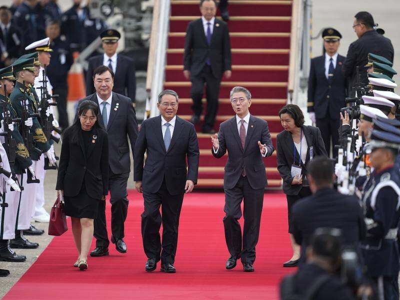 South Korea's Kim Hong-kyun has welcomed Chinese Premier Li Qiang to Seoul for trilateral talks. (AP PHOTO)