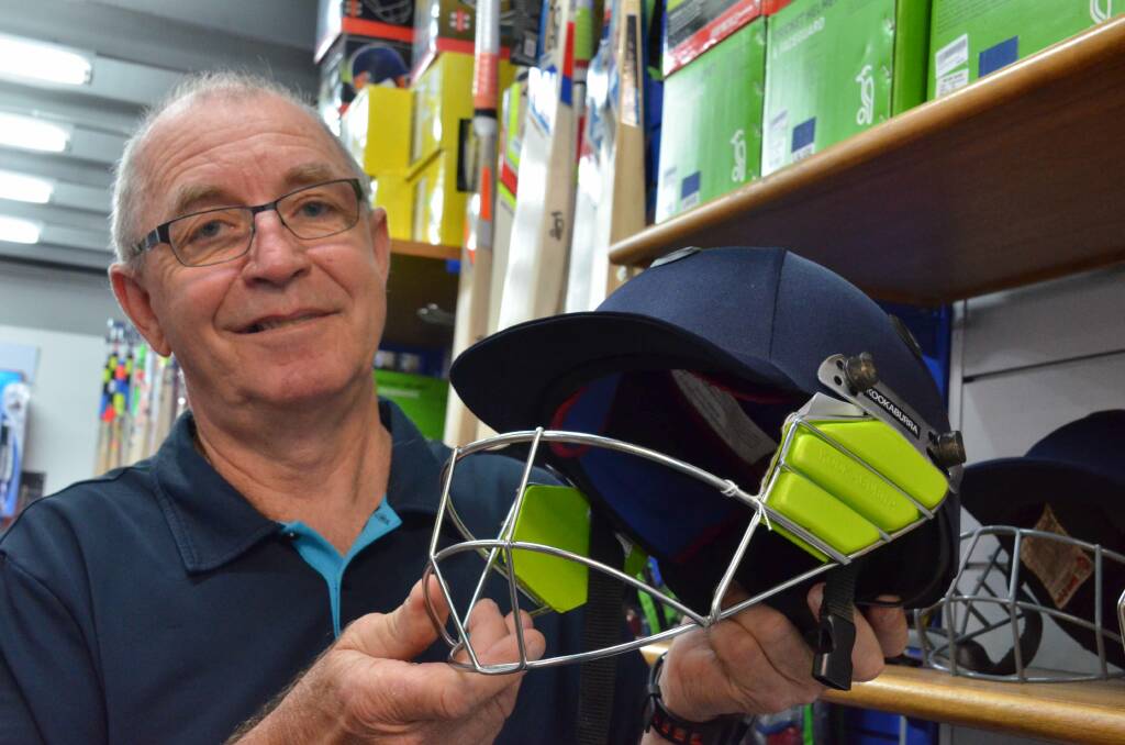 Safety first: Sportspower manager Ian Gorton says cricket helmet sales have increased since Phillip Hughes tragic death.