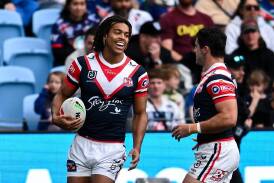 Dom Young scored a double as the Roosters crushed the Warrions 38-18. (Steven Markham/AAP PHOTOS)