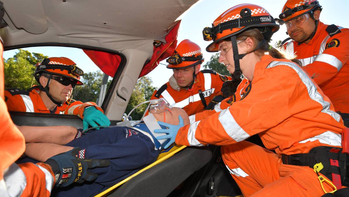 To the rescue: Port Macquarie SES members Michael Brumby, Scott Witchard, Sereena Ward and Alfred Portenschlager in training. Photo: Ivan Sajko