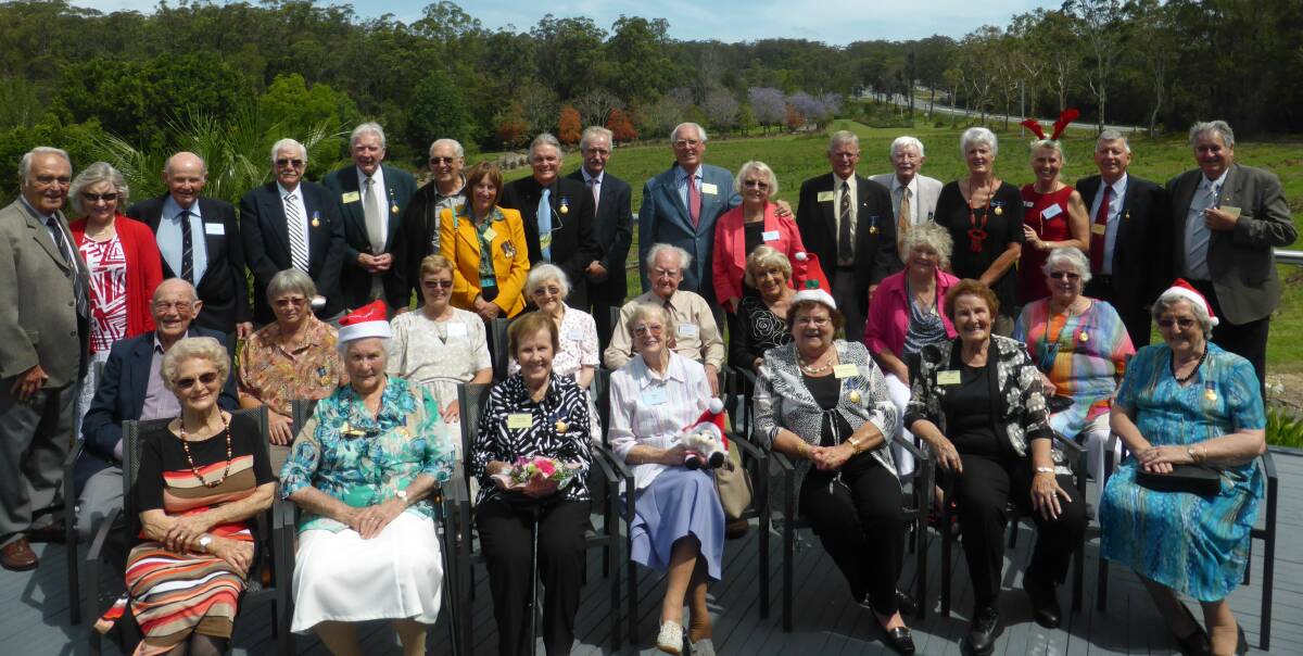 A fine group: Members of the Order of Australia Association celebrate their Christmas party at Cassegrains Winery and welcome new members to the group.